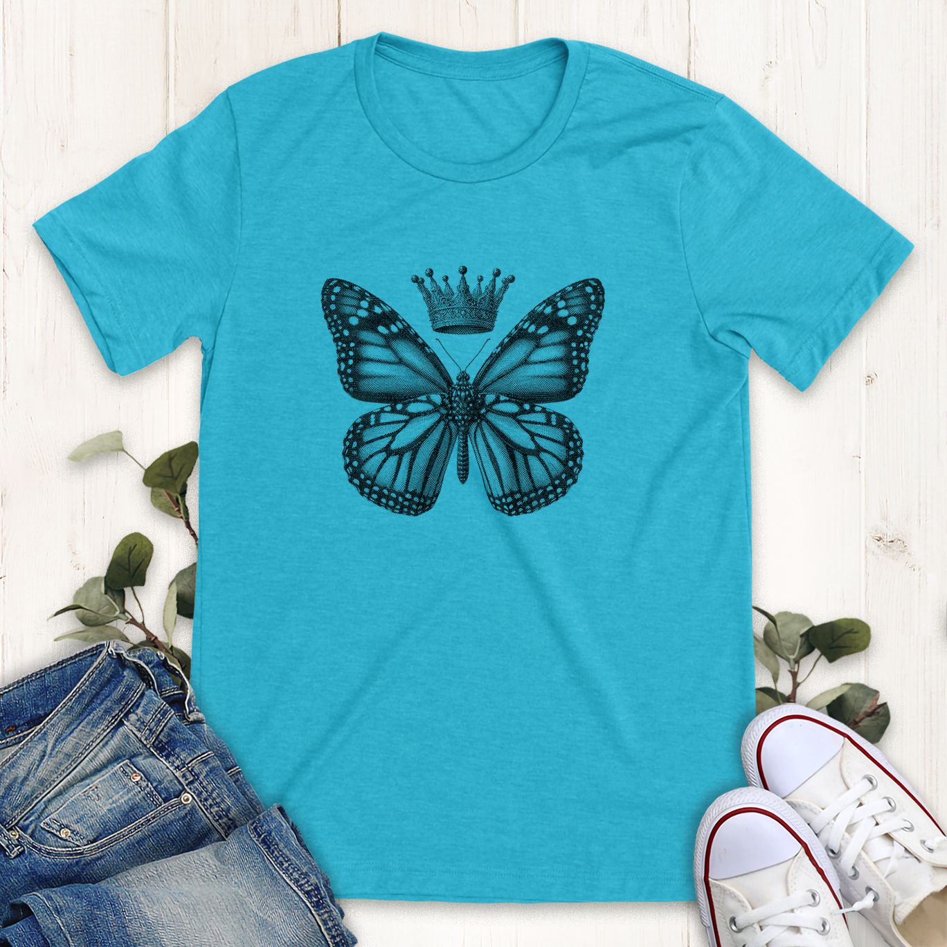 Heather aqua blue monarch butterfly with a royal crown graphic t-shirt by Thistle and Brass