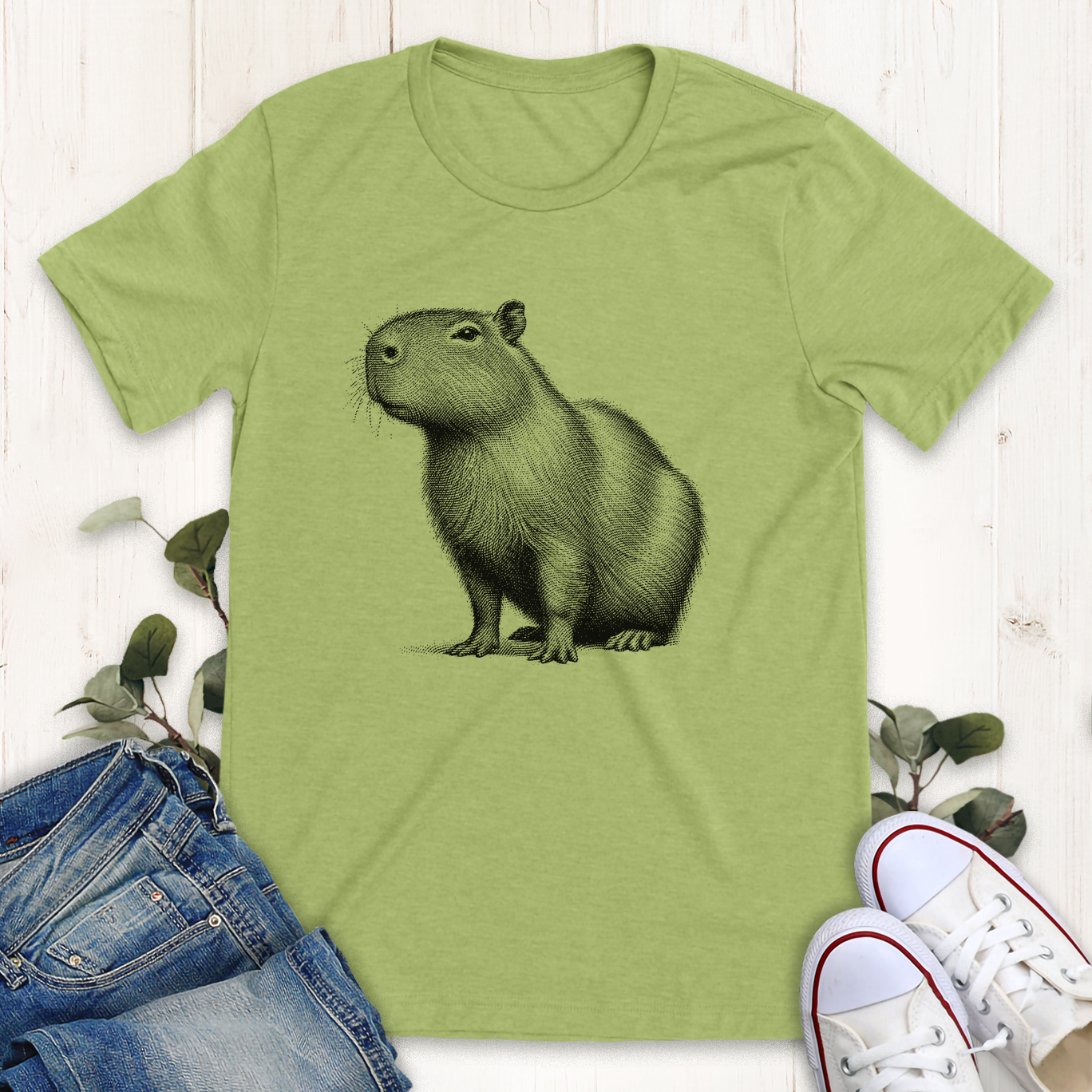 Heather Green color Capybara graphic t-shirt by Thistle and Brass