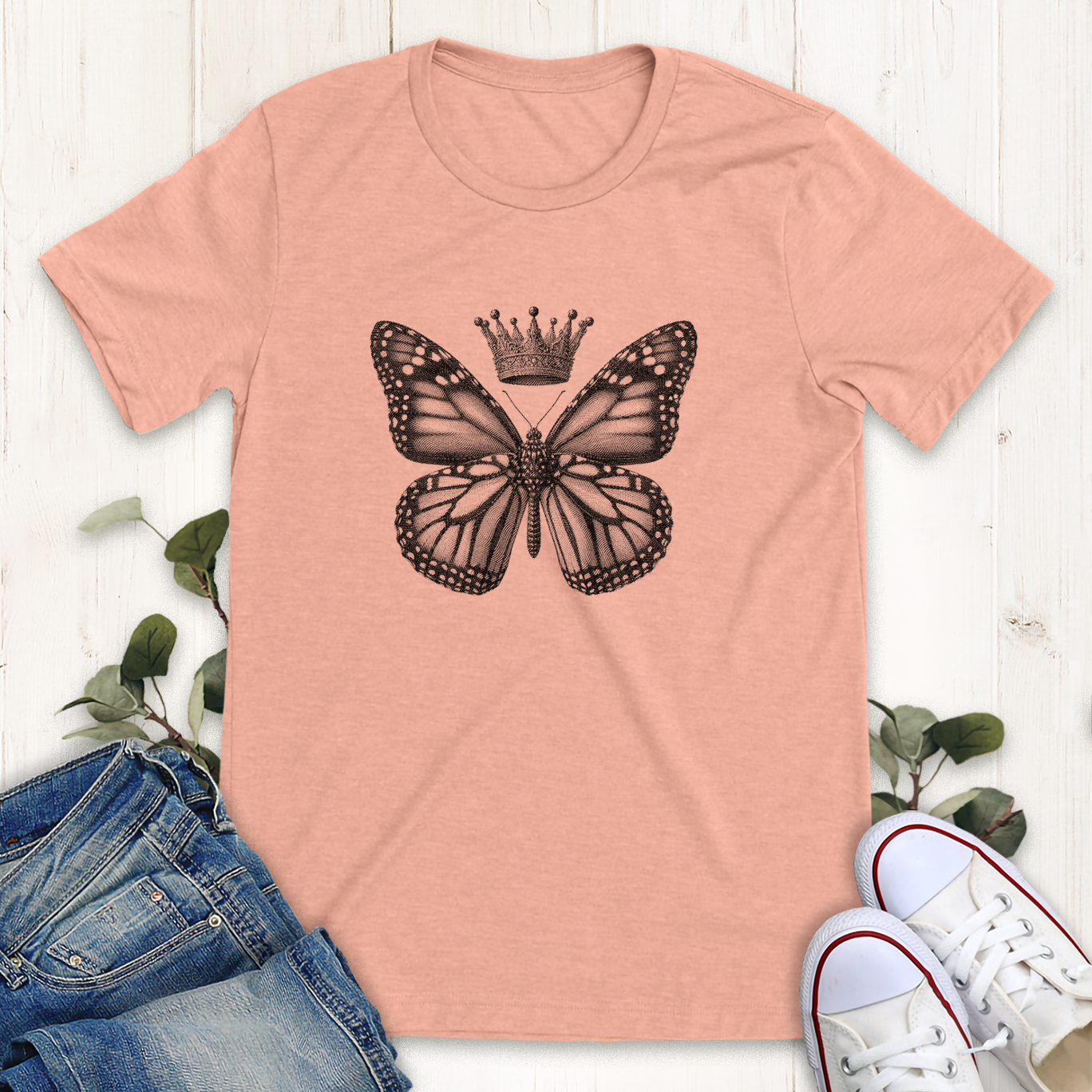 Heather peach color monarch butterfly with a royal crown graphic t-shirt by Thistle and Brass