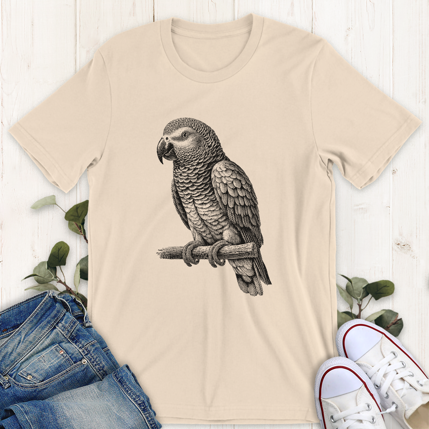 Soft cream African grey parrot graphic t-shirt by Thistle and Brass